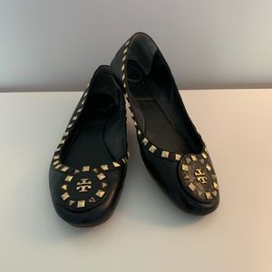 Tory Burch black leather flats with gold detailing
